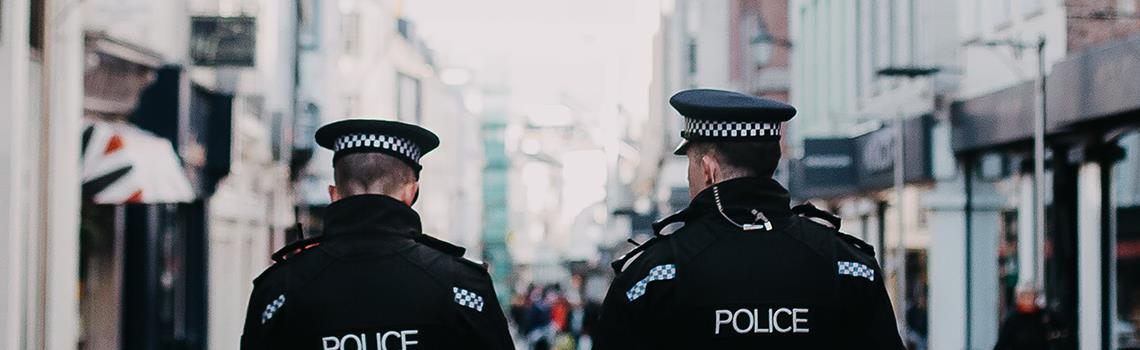 Police walking down high street